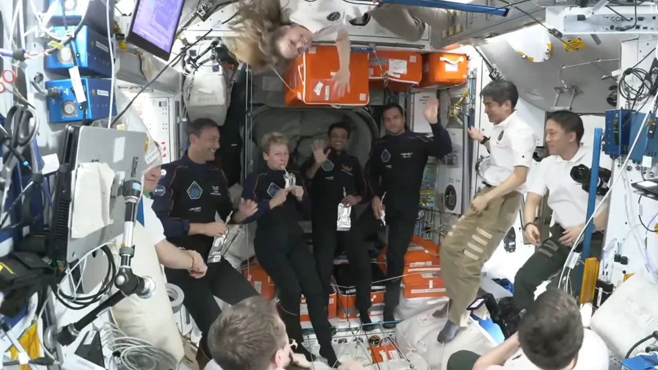 The Axiom-4 mission crew is seen waving to the ground station from the ISS.