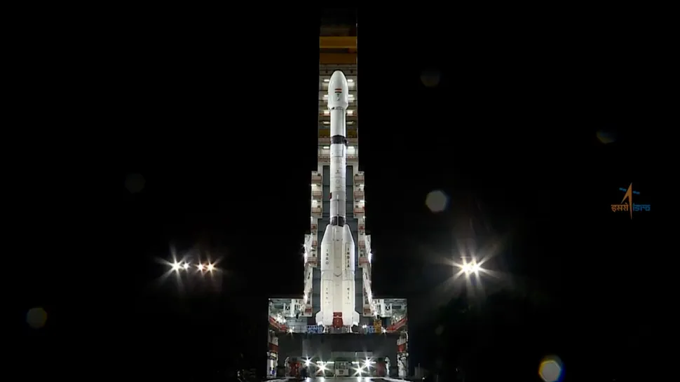 ISRO's GSLV rocket on the launchpad at night.