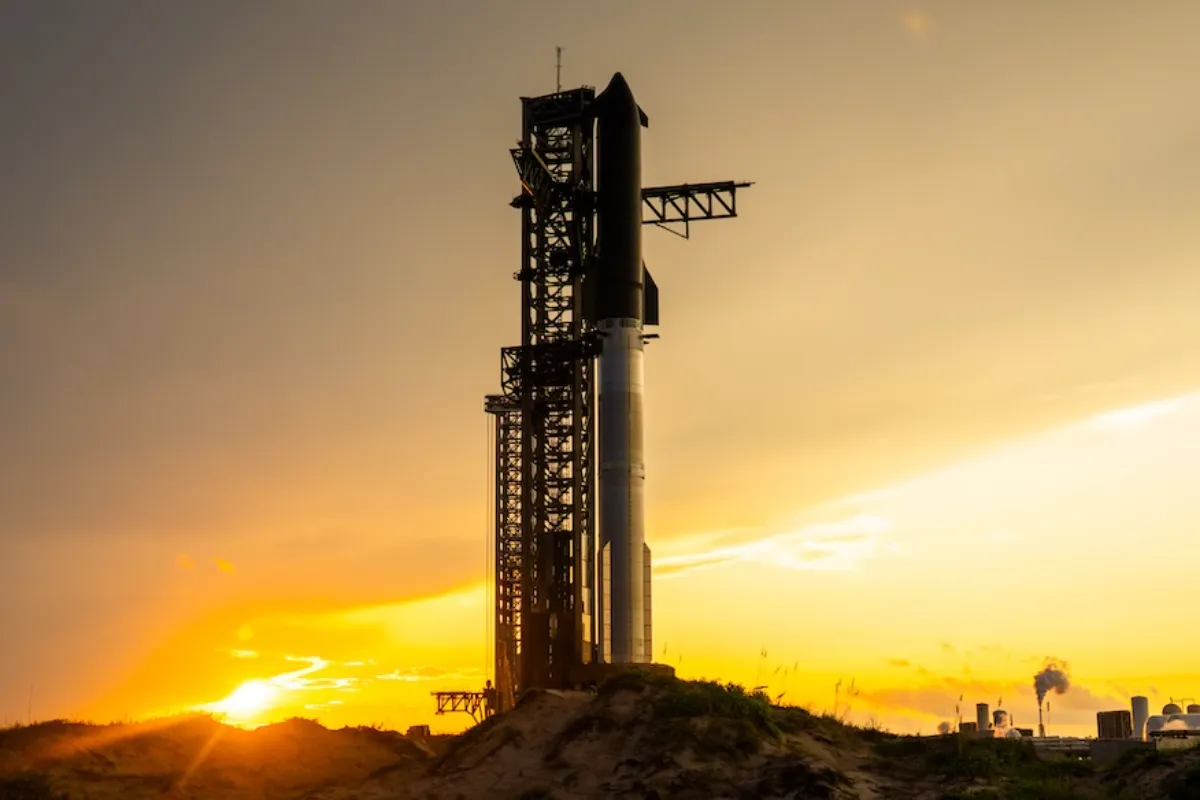 SpaceX Starship on the launchpad during a sunset.