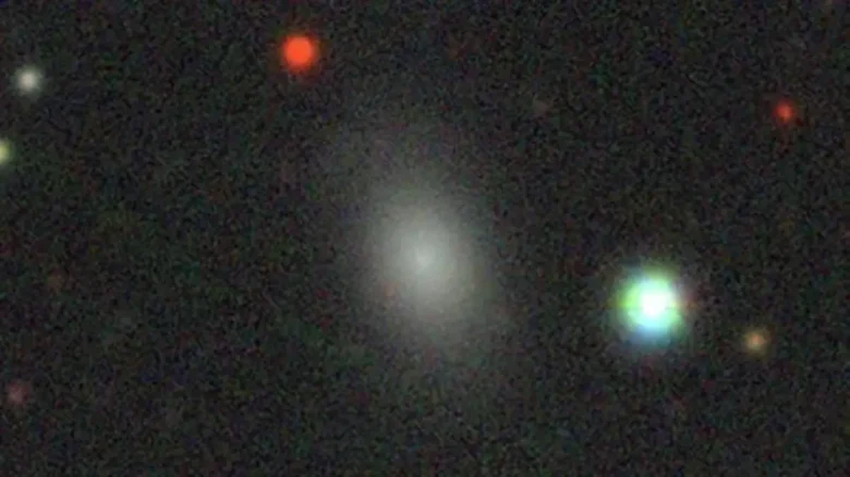 A rare "runaway" dwarf galaxy named dE01+09.