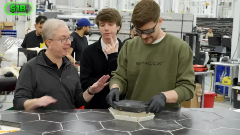 MrBeast installing a heat shield tile on SpaceX Starship.