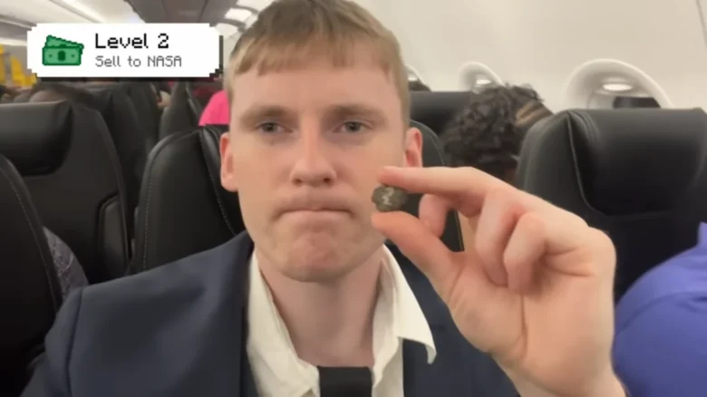 YouTuber Sendri Levi holding a meteorite.